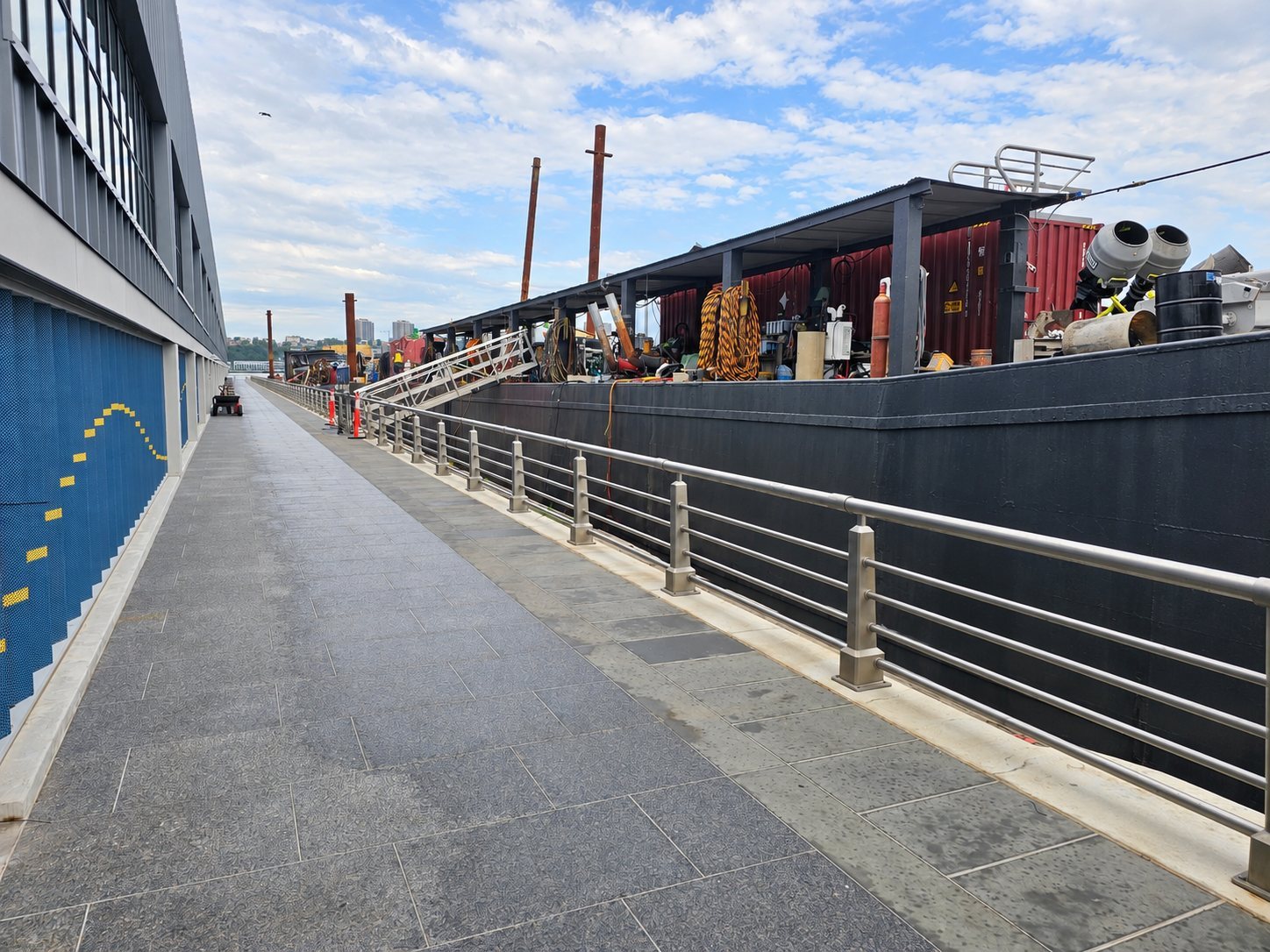 Reicon marine construction barge alongside Pier 94 in Manhattan